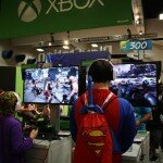 SDCC 2013 - Superman and Little Joker playing Ryse